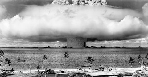 USA/Marshall Islands: Mushroom-shaped cloud and water column from the underwater Baker nuclear explosion of July 25, 1946. Photo taken from a tower on Bikini Island, 3.5 miles (5.6 km) distant. (Photo by: Pictures from History/Universal Images Group via Getty Images)