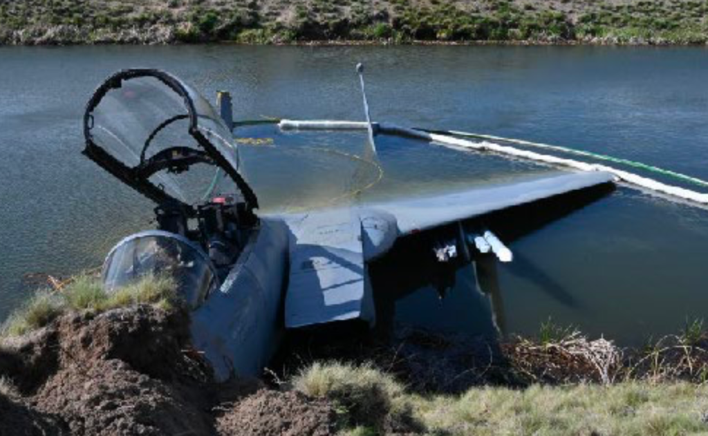 An Oregon Air National Guard F-15 ended up in a drainage ditch at Kingsley Field, Oregon when its pilot did not use emergency braking systems, an Air Force investigation found. The base's control tower lowered a last-ditch arresting cable that might have stopped the plane after a confusing radio exchange with the pilot. Photo from final accident report.